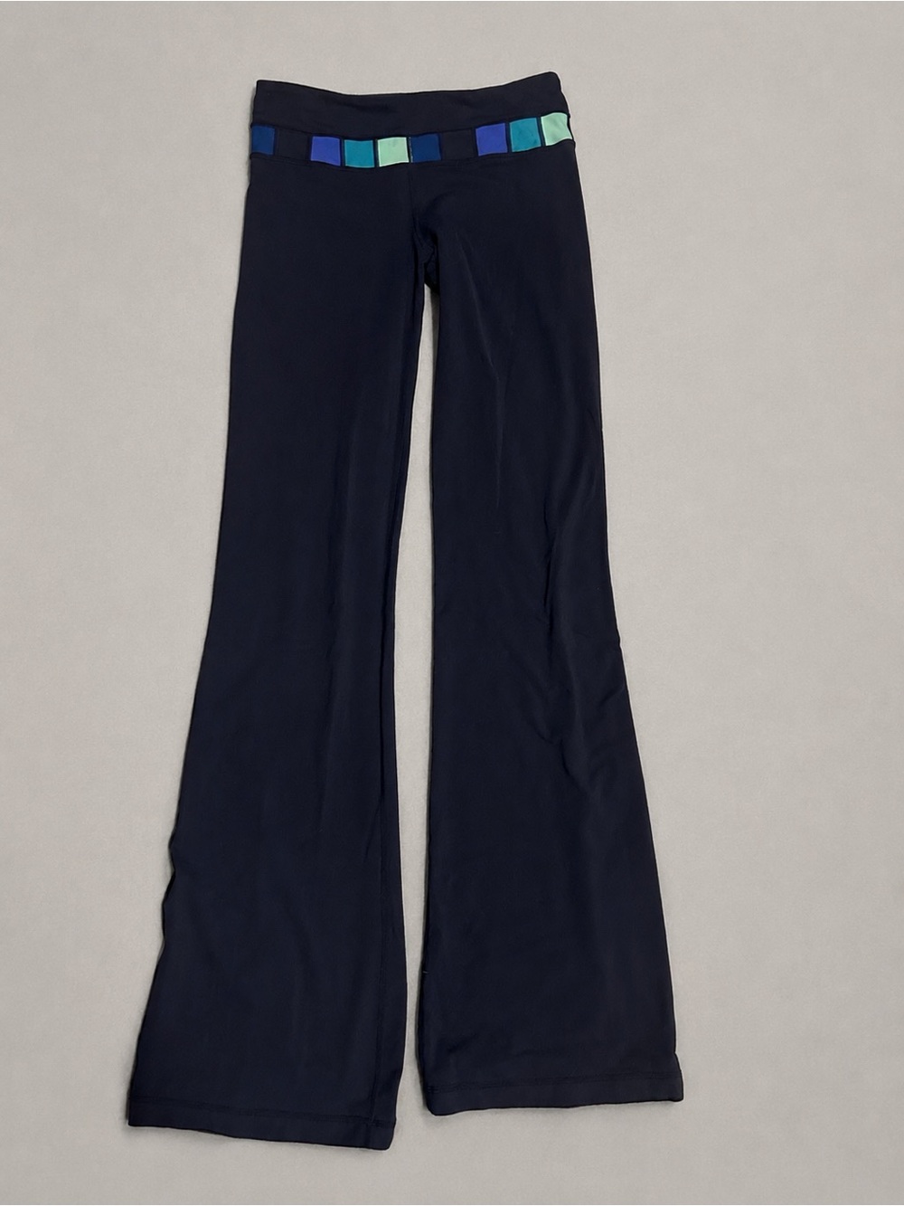 LULULEMON Women's Navy Flare Pants with Blue Tile Waistband. Tall girl friendly
